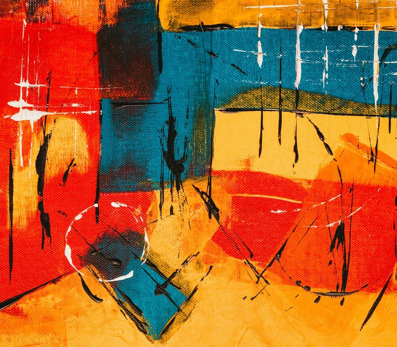 Dynamic abstract art piece with vibrant colors and bold brushstrokes, showcasing creativity.